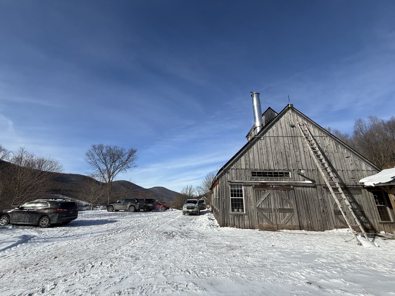 A gateway antenna on the peak of a sugarhouse roof